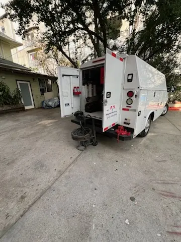 Magnet Plumbing service vehicle on-site for Grease Trap Cleaning in Panama City